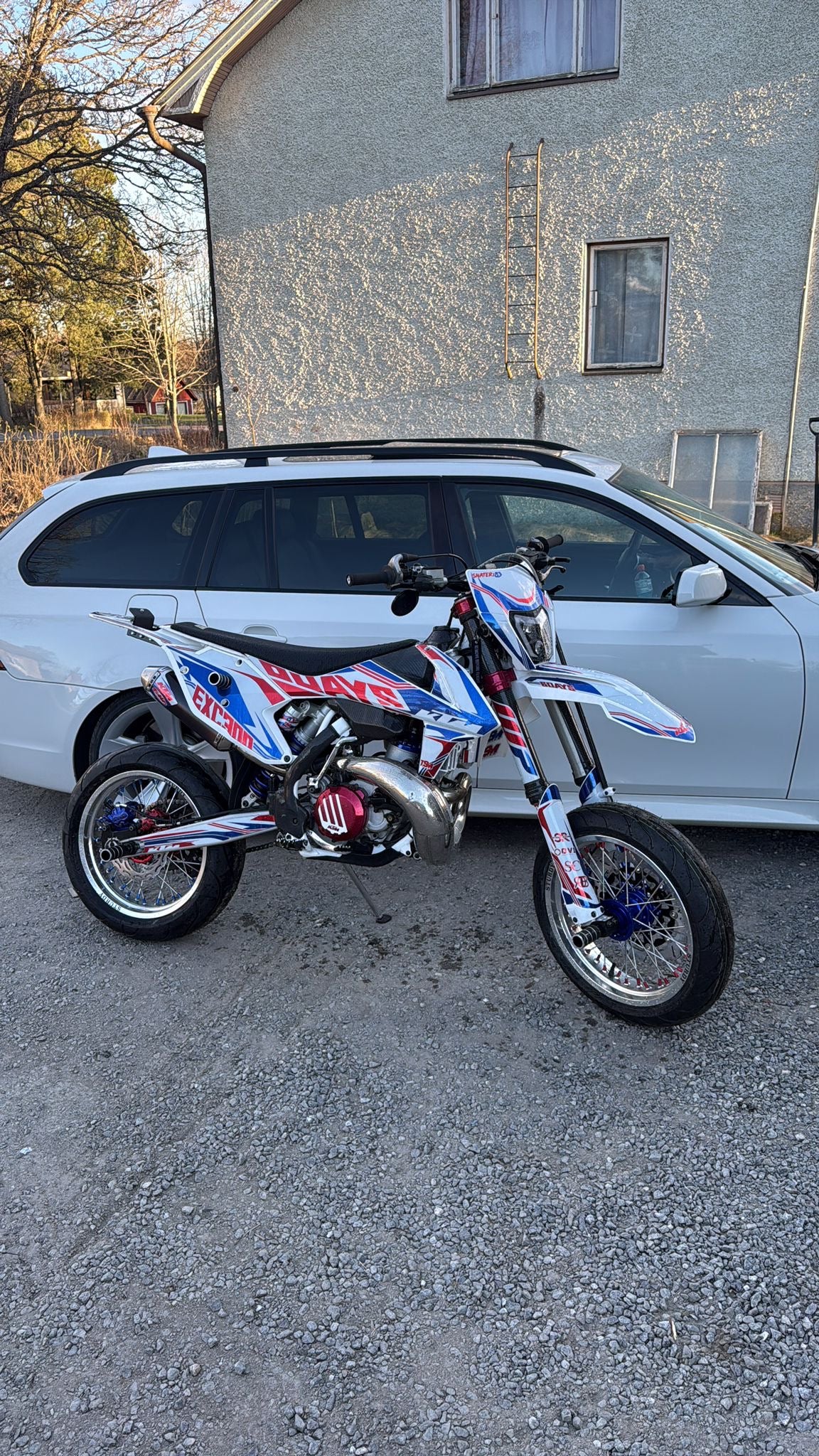 KTM EXC 300 supermoto on Sturdy custom wheels – silver rim, blue hub